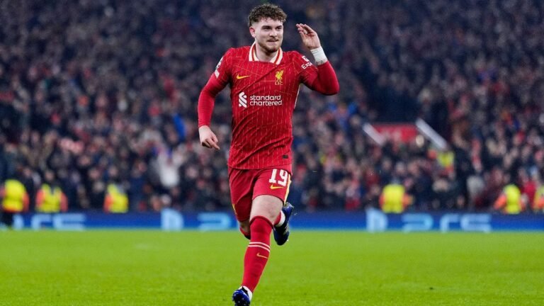 Liverpool 2-1 Lille: Elliott winner secures last 16 place for Reds against 10-man Lille