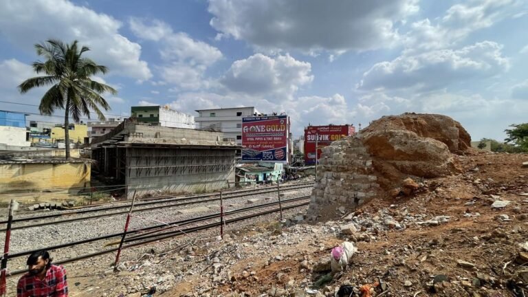 V. Somanna checks the onoing road across the bridge work between Padarayanaphu and Hosahalli