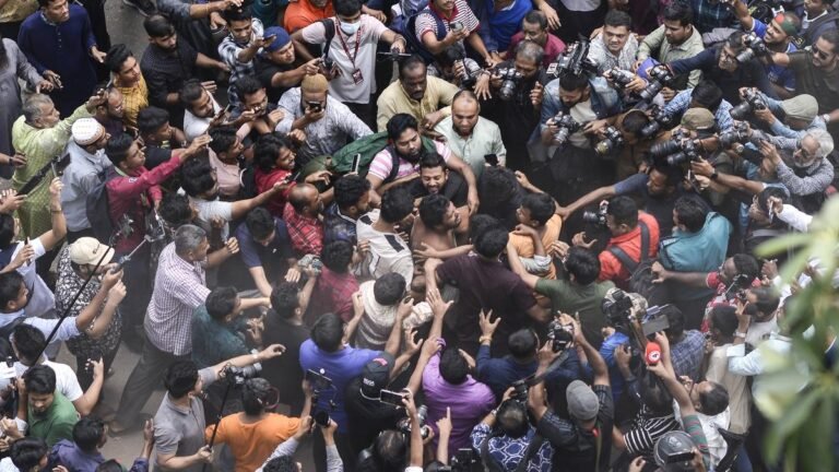Awami League supporters look at the uncertain future under the temporary government