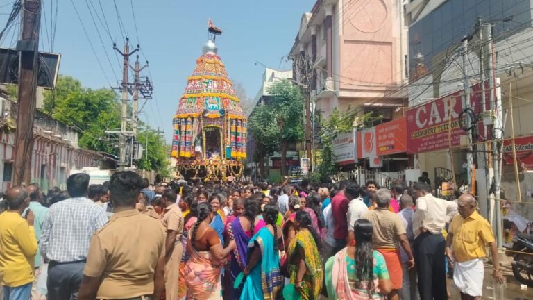 Devackers are pulling decorated cars from the Rockfort temple