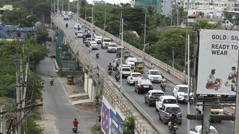 Narrow stripes, no median on the overpass of RK Puram makes commuting gambling