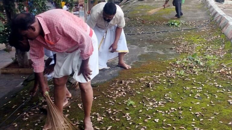 Volunteers clean the Mahanandi Temple in Nandyal