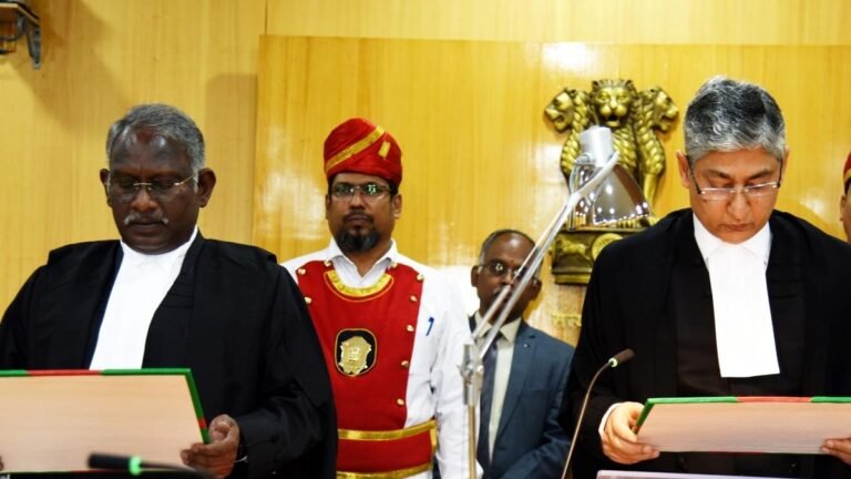 Justice Batta Devanand folds an oath as a judge of the High Court Andhra Pradesh