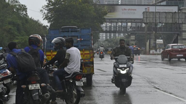 Commuting fights as a sudden downpour flood Hyderabad