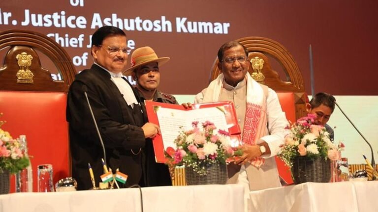 Judge Ashutosh Kumar folds an oath as the chief judge of the High Court Gauhati