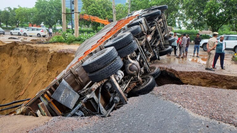 Viral Video: Truck transporting bottles with alcohol falls into the crater as GURRONGRAM Caves Tech Word News