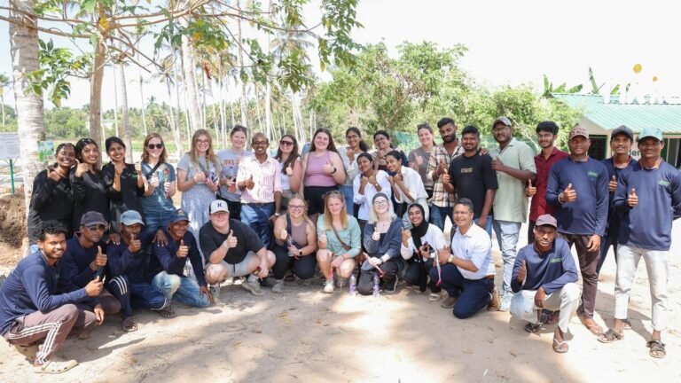 Students, teachers from Iowa State University visit a local farm