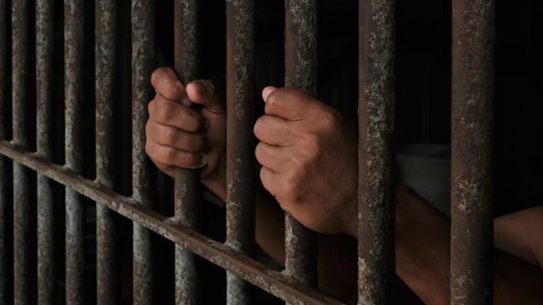 Man charged in recent riot murder case shot in leg and arrested