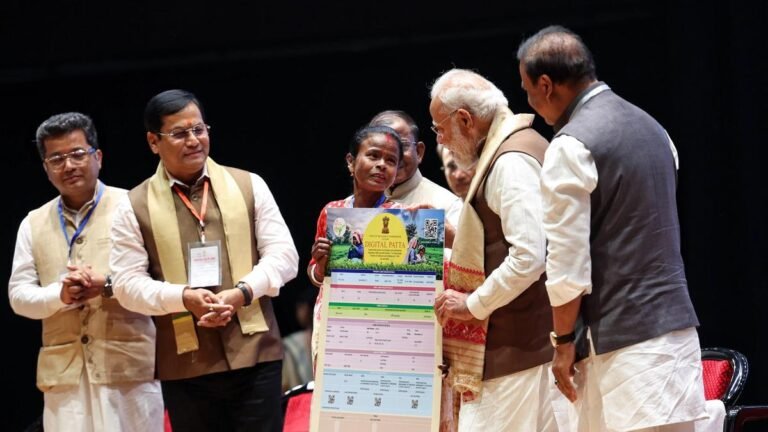 PM distributes plots to Assam’s tea workers