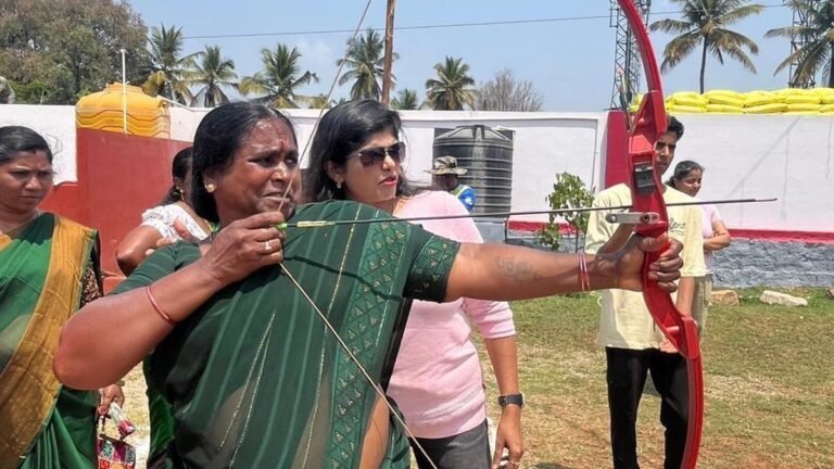 Women pourakarmikas participate in the archery program