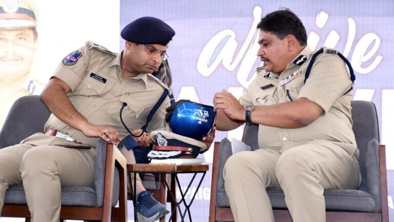 Woxen University students demonstrate a smart safety helmet at a road safety drive