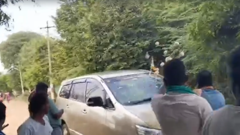 AIADMK workers throw eggs on the guerillas’ car to get votes for the BJP candidate
