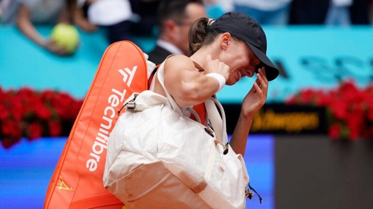 Iga Swiatek retires ill in Madrid Open title defense against Ann Li