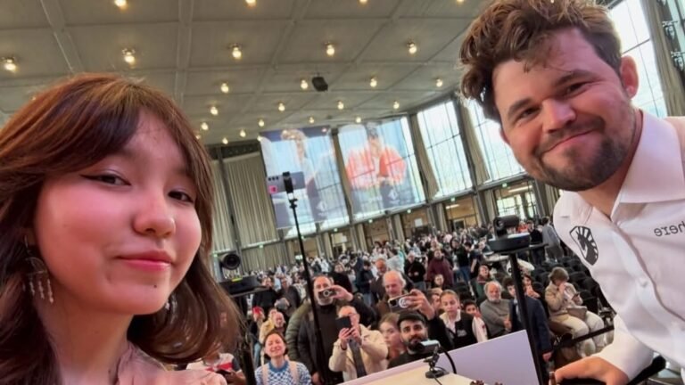 Magnus Carlsen takes a selfie with his opponent, calls the official to take his phone off: Watch