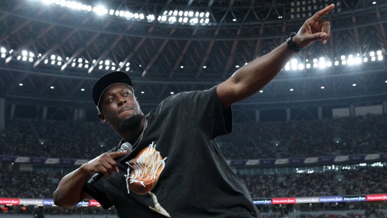 Usain Bolt reacts to Australian teenager Gout Gout breaking his U20 world record