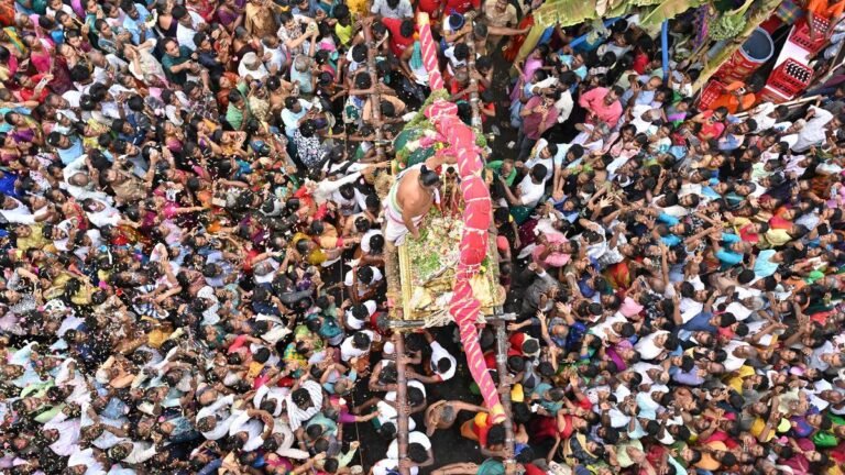 Devotees throng the streets of Madurai to catch a glimpse of Lord Kallazhagar