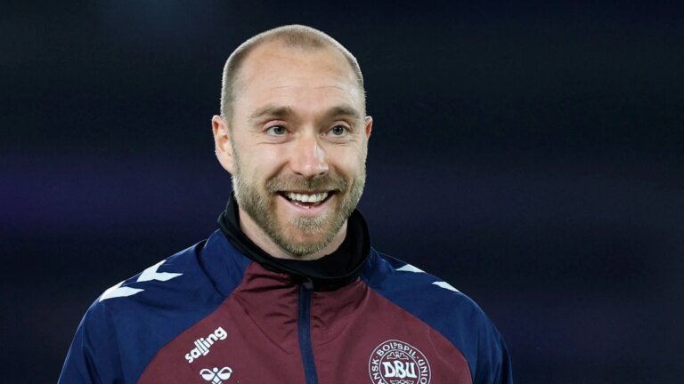 Christian Eriksen in good spirits, ready to be dismissed after a heart scare midway through the match