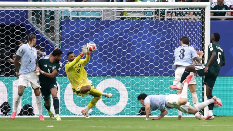 Saudi Arabia held off a relentless Uruguay attack to draw 1-1 in Miami