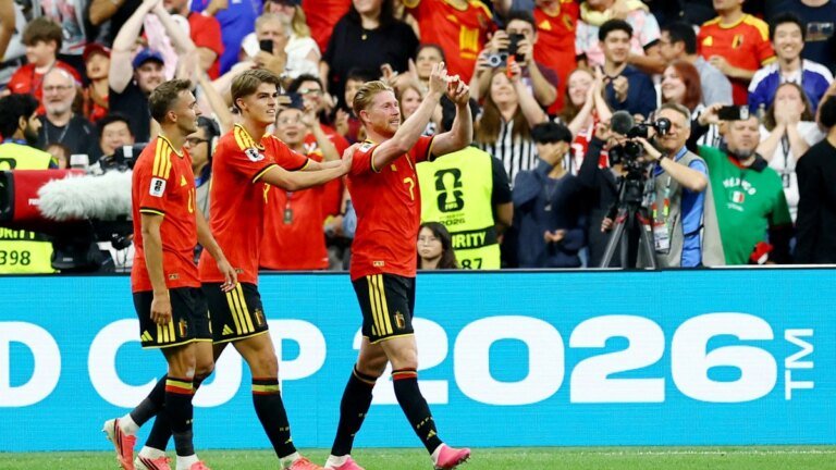 Belgium beat NZ to reach knockouts, Iran face anxious wait after Egypt draw