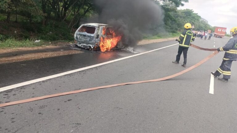 A family escapes unhurt after a car catches fire near Jolarpet
