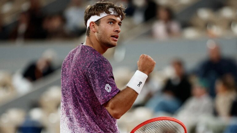 Flavio Cobolli fights past Felix Auger-Aliassime to reach first Grand Slam semi-final