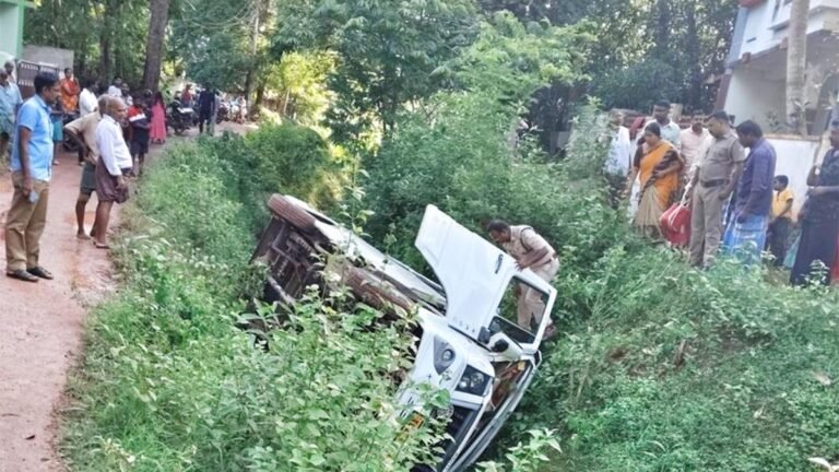 A school bus flips into a canal