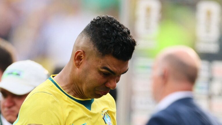 A tearful Casemiro comforted by journalists after Brazil’s painful exit from the World Cup