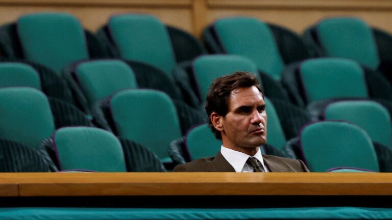 Did you think Roger Federer was alone at Wimbledon? His cheeky response says otherwise