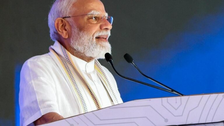 Modi hits out at critics as he opens freight corridor