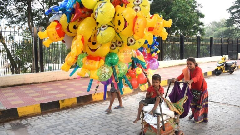 An NGO seeks safety for families of migrant street vendors during Dasara